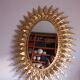Miroir soleil doré vintage