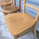 Set of four mismatched bistro chairs