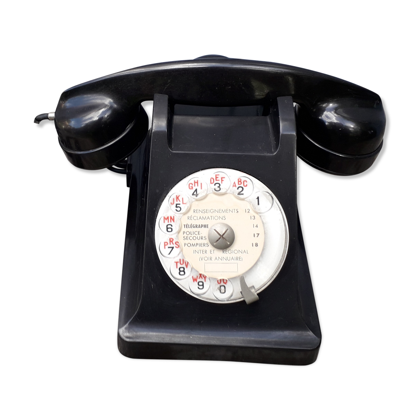 Phone has dial in bakelite