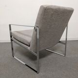 Pair of designer armchairs
