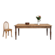 Vintage farmhouse table with turned legs.