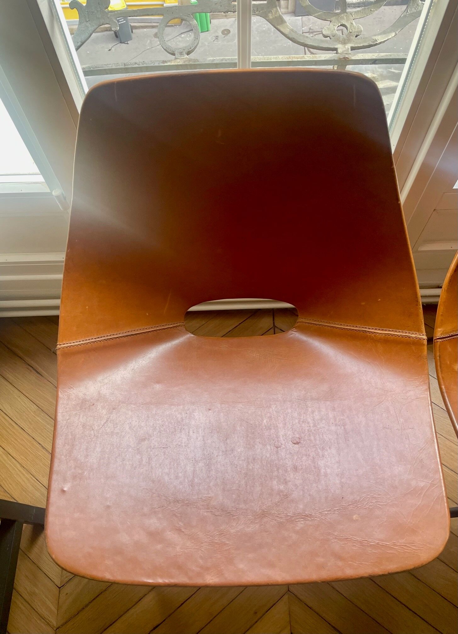 Chair "Tonneau" Pierre Guariche in leather