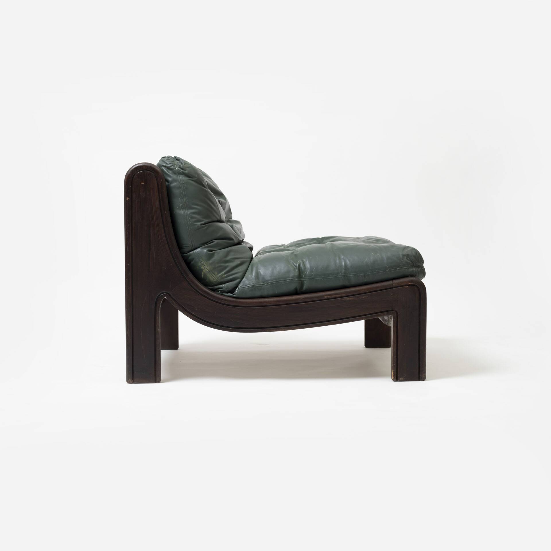 Pair of low sling chairs in hardwood and leather, Germany, 1970s