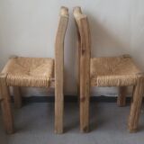 Pair of brutalist chairs in wood and straw