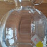 Glass ball vase with corolla