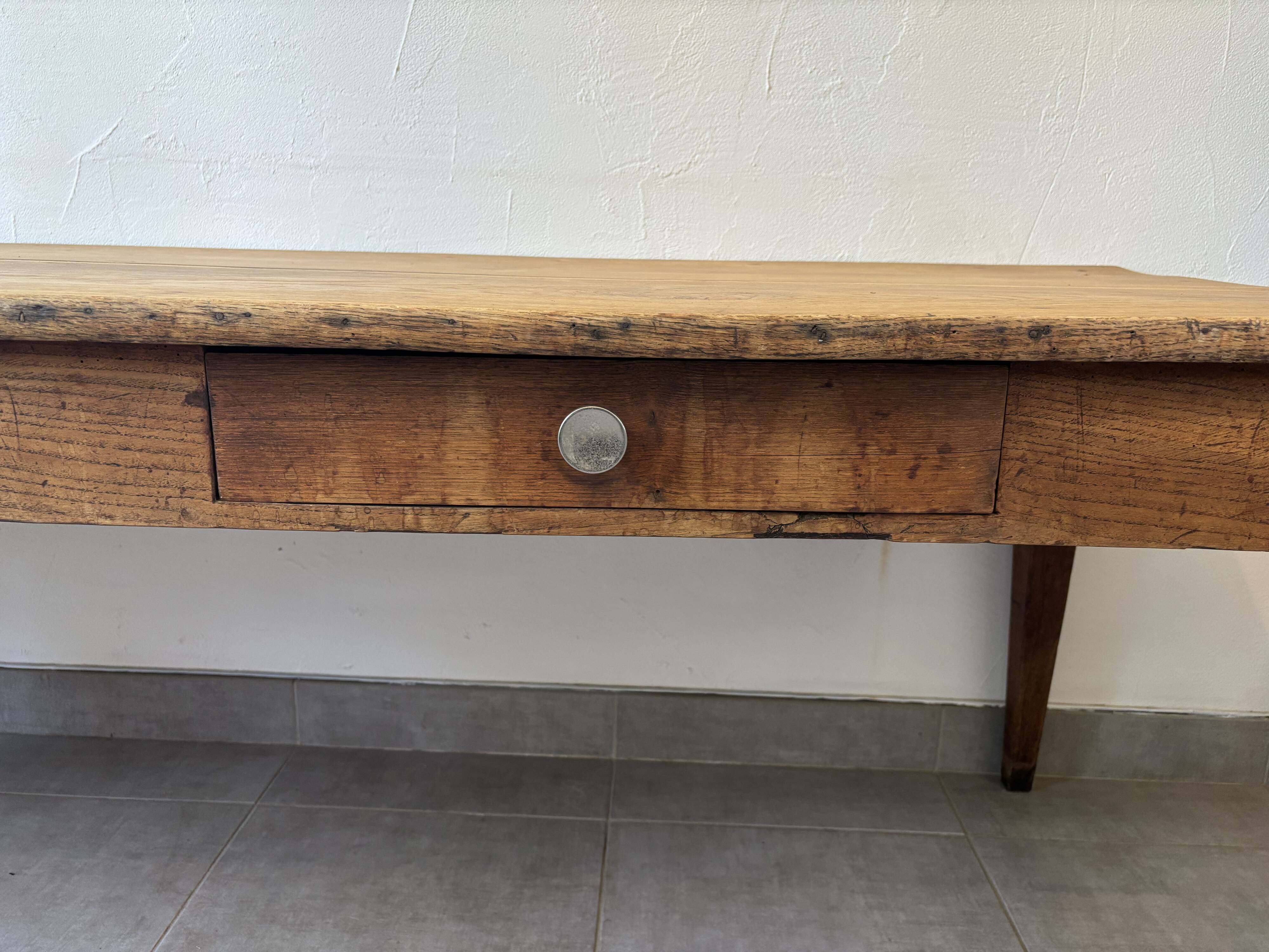Authentic vintage farmhouse table from the 1950s in solid oak.