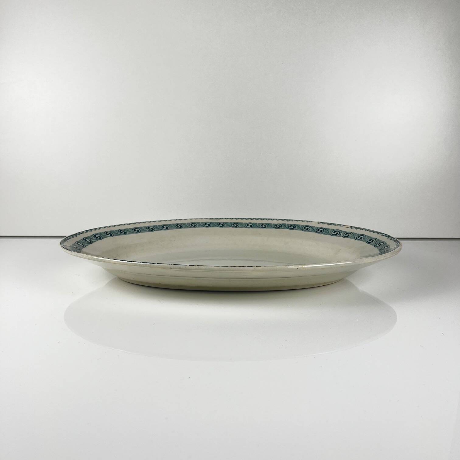 Large oval dish "Rachel" Moulins des loups & Hamage, iron earth, 20th century