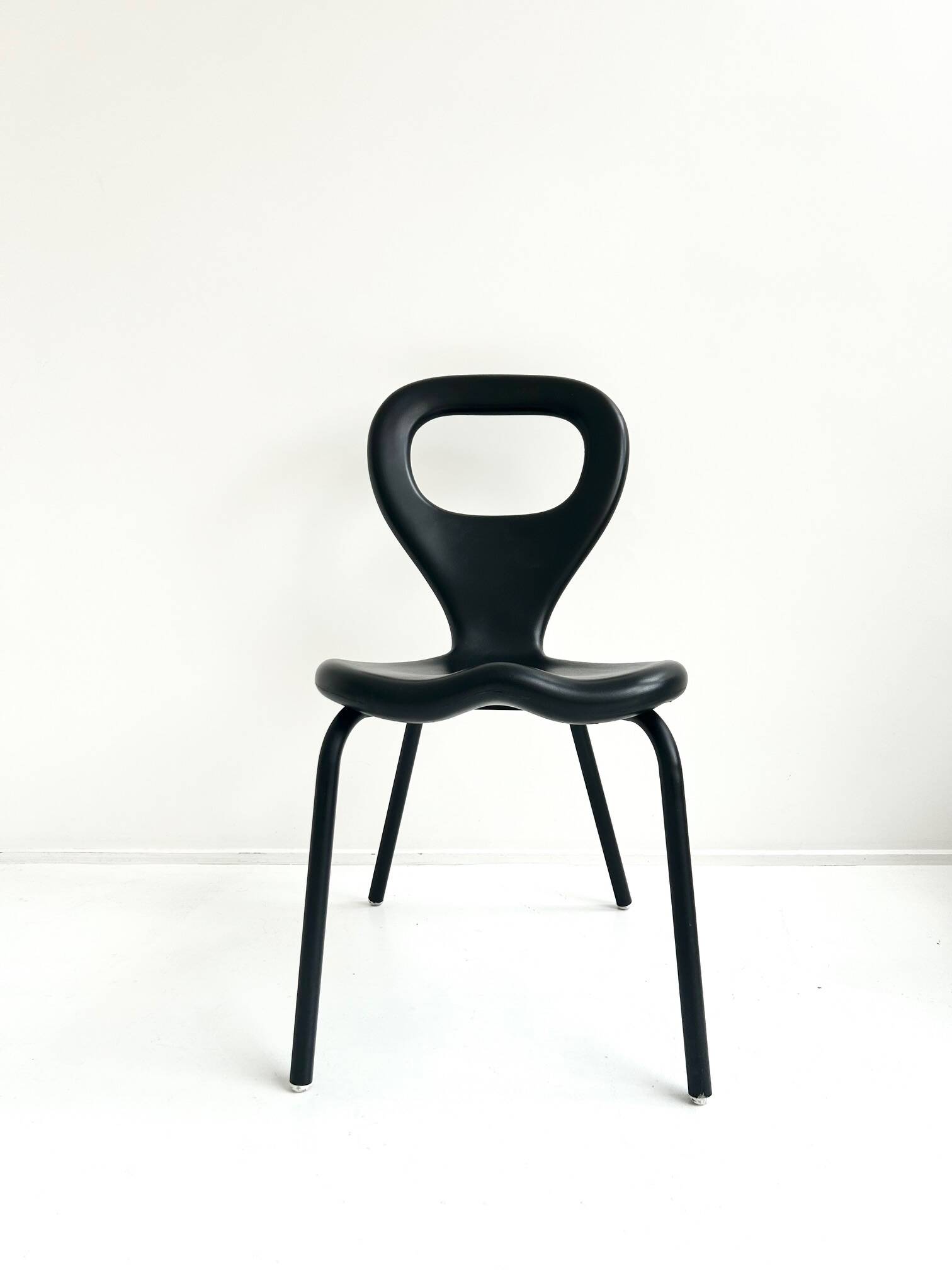 Pair of "TV chairs" by Marc Newson for Moroso 1993