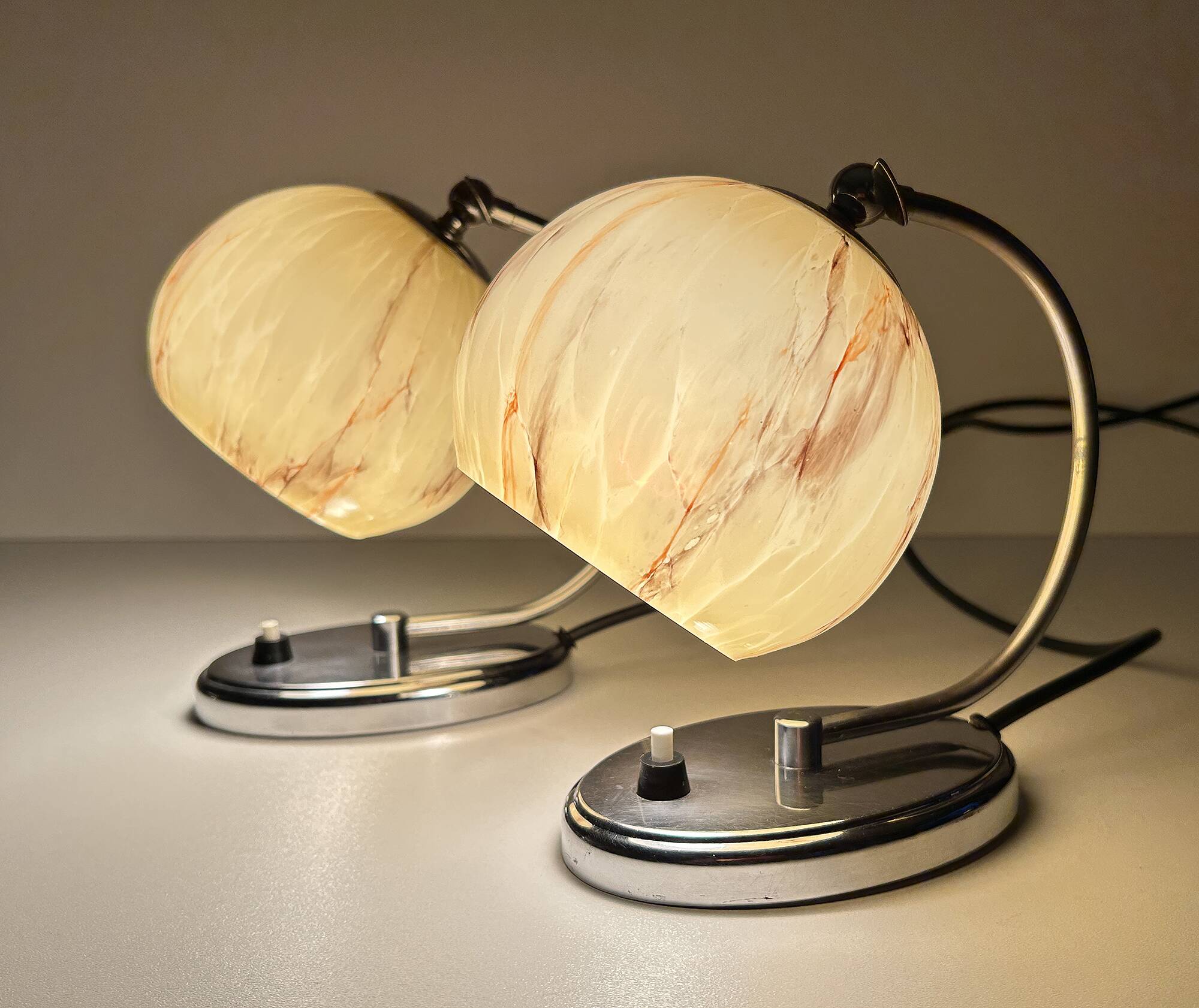 Pair of art deco lamps, chrome glass