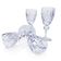 Cut crystal white wine glasses with a slender baluster-shaped stem.