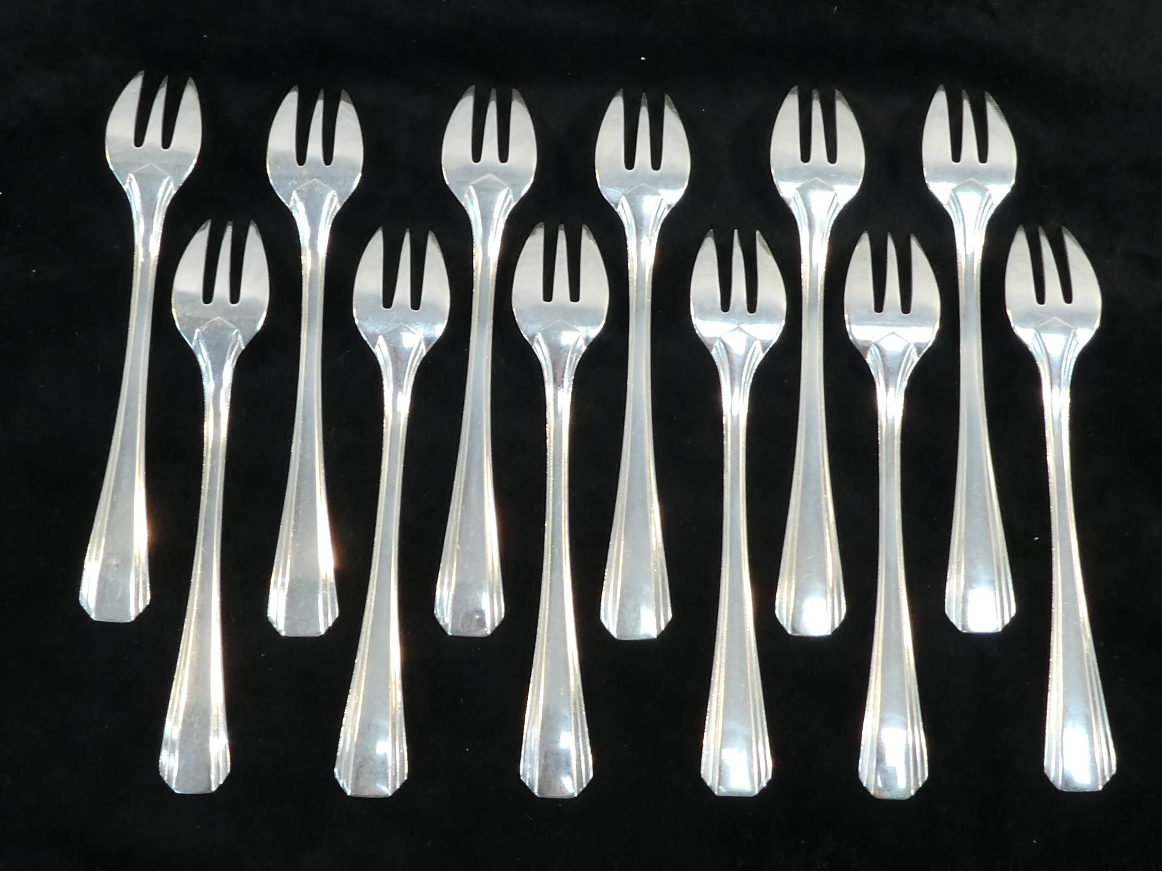 12 forks christofle art deco model boreal by luc lanel