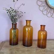 Amber glass vase bottle
