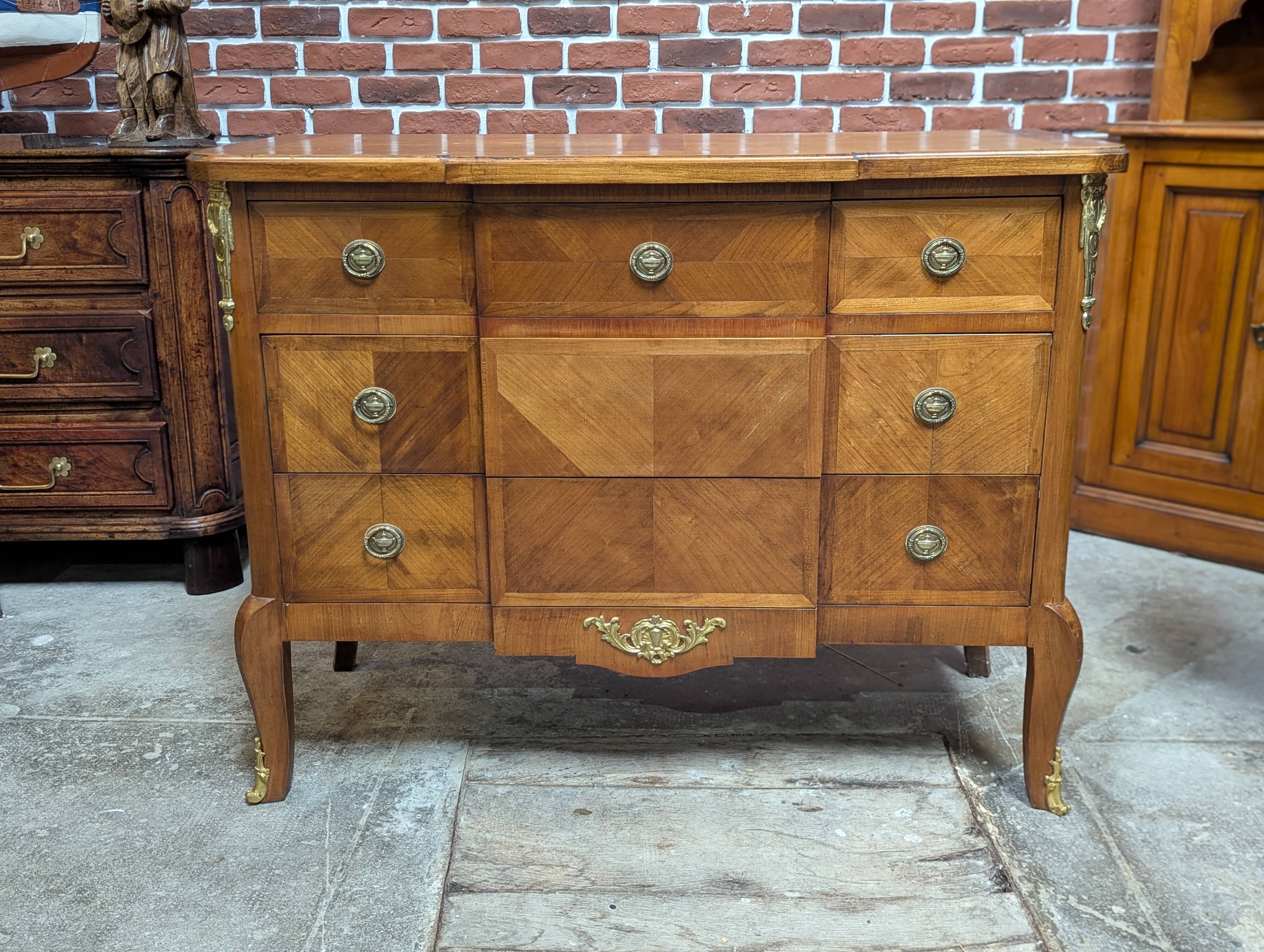 Transitional style inlaid chest of drawers