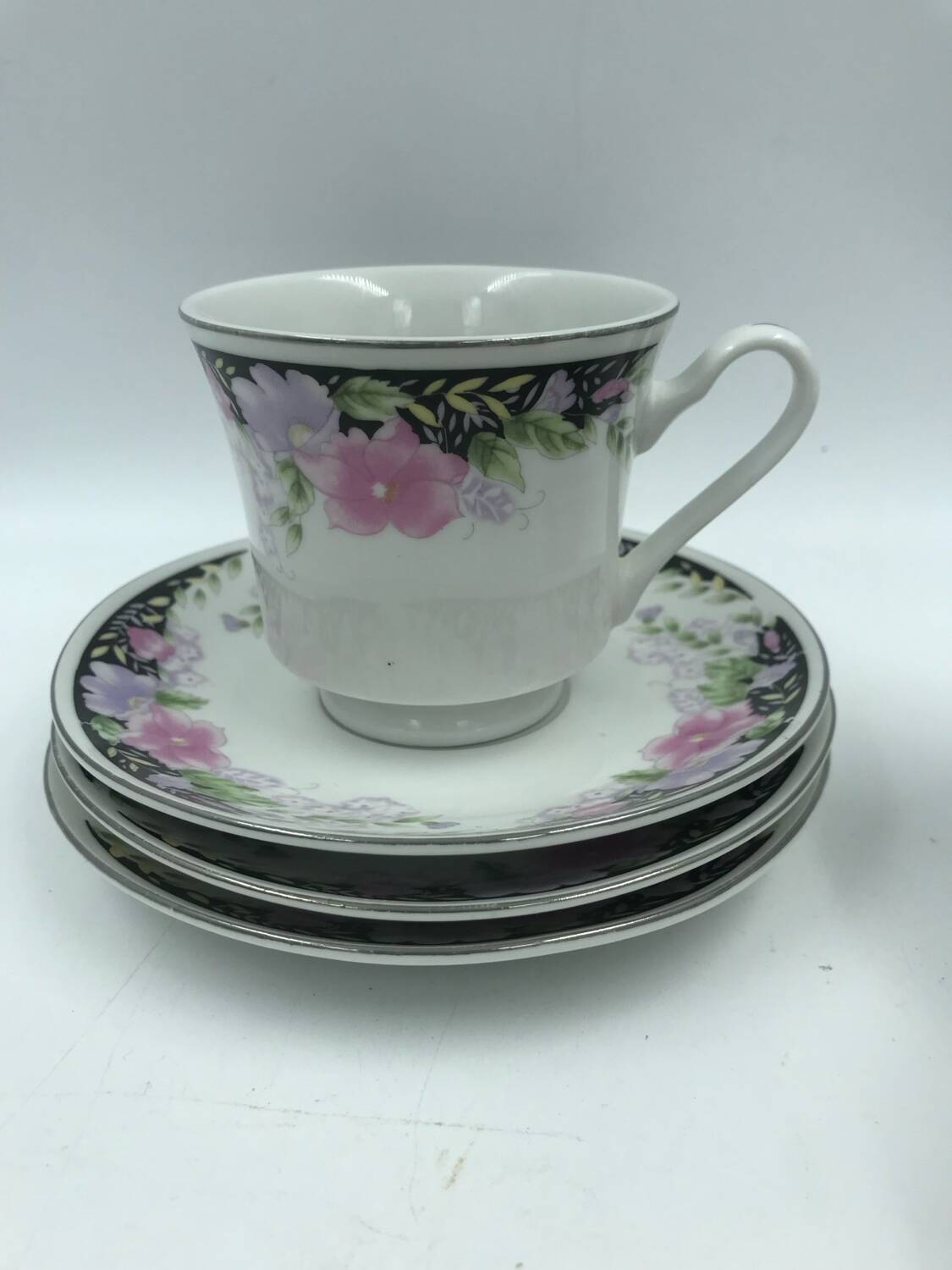 3 large cups and saucers