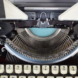 Olympia typewriter with suitcase
