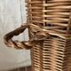 Woven wicker basket, vintage rod holder