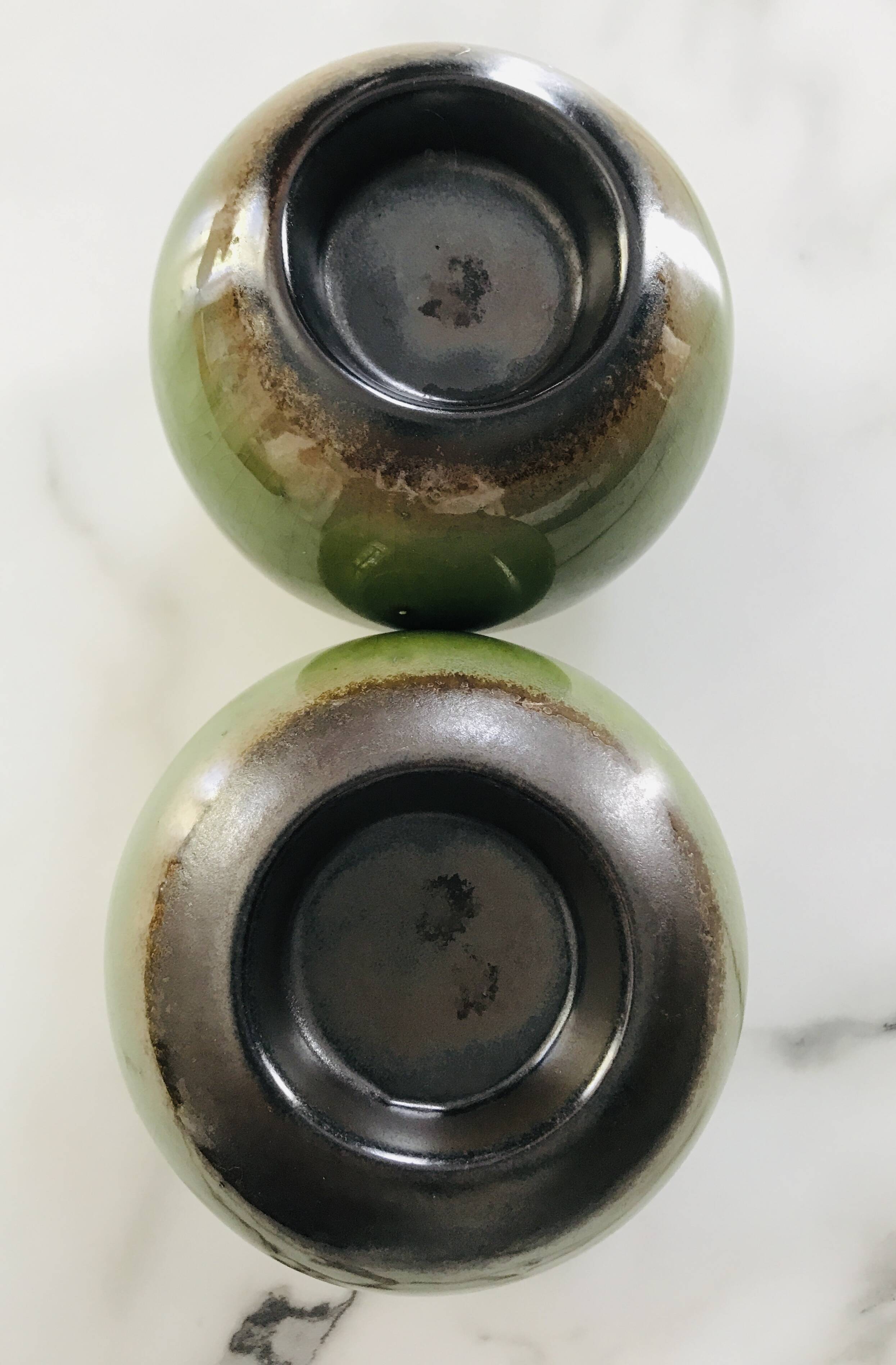 Pair of ceramic ball candlesticks