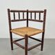 Corner chair in Arts and Crafts style made of oak with a rush seat, 1950s.