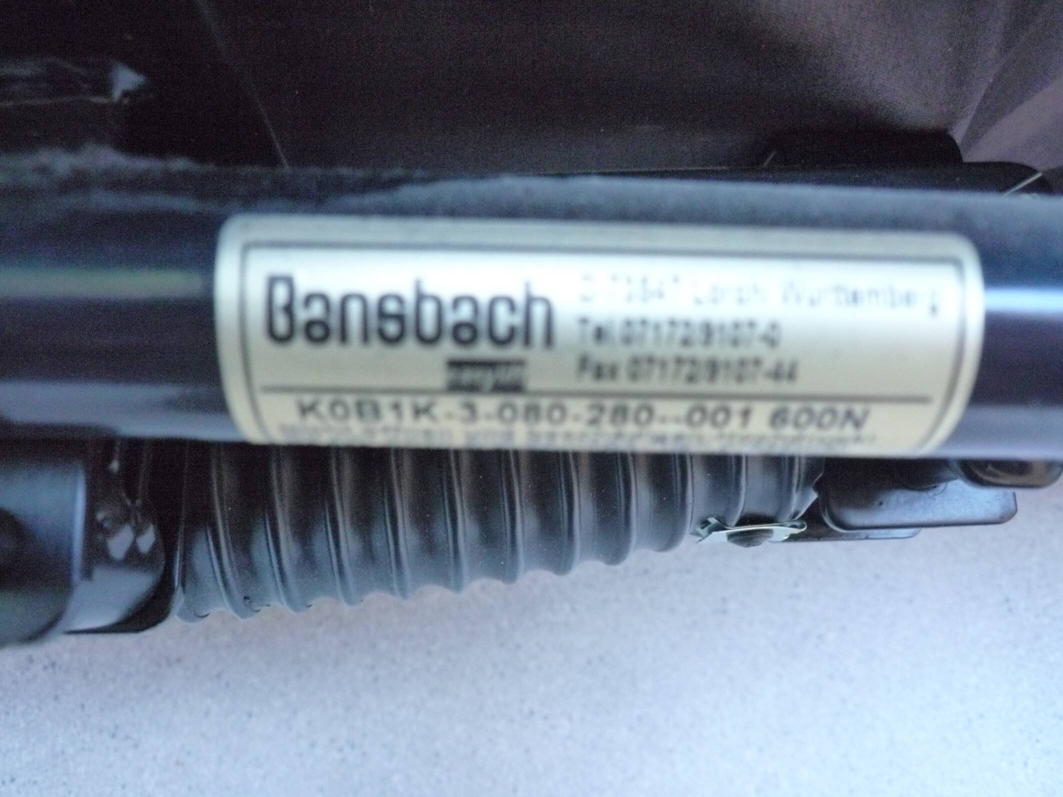 XDark brown leather chaise longue