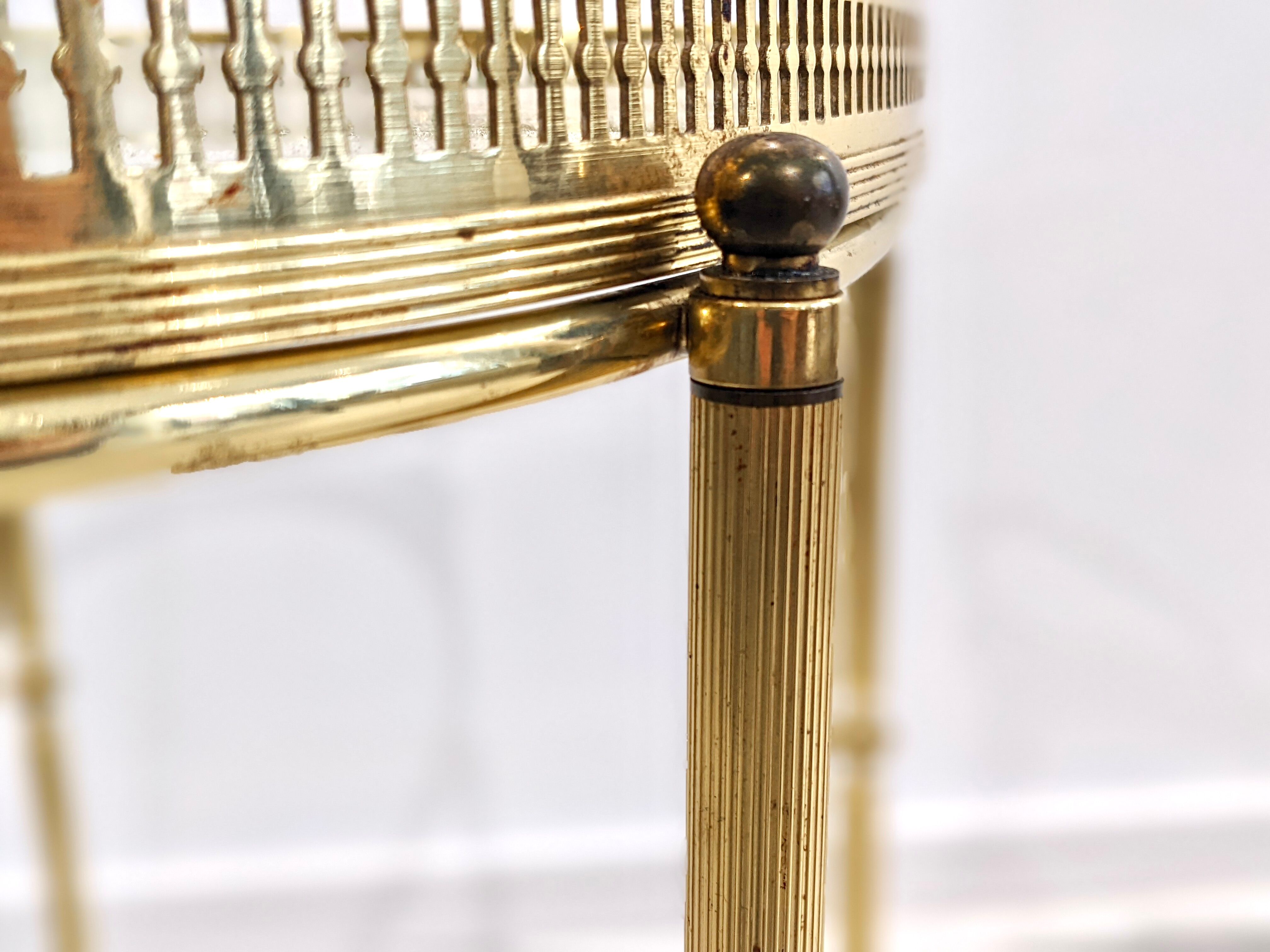 Golden metal dessert with glass tops