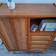 Vintage rattan cabinet with compass feet, old wicker chest of drawers