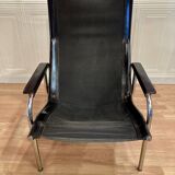 Black leather reclining lounge chair, "Hans Eichenberger" design, 1960.