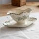 Antique sauce boat, ironstone, ivory with green floral and butterfly decoration.