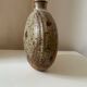 Vintage round, flat-bottomed stoneware bud vase