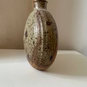 Vintage round, flat-bottomed stoneware bud vase