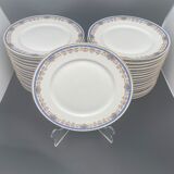 Limoges porcelain flat plates with blue border and small pink flowers