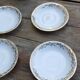 Set of 4 cups and sugar bowl Haute porcelaine de Berry