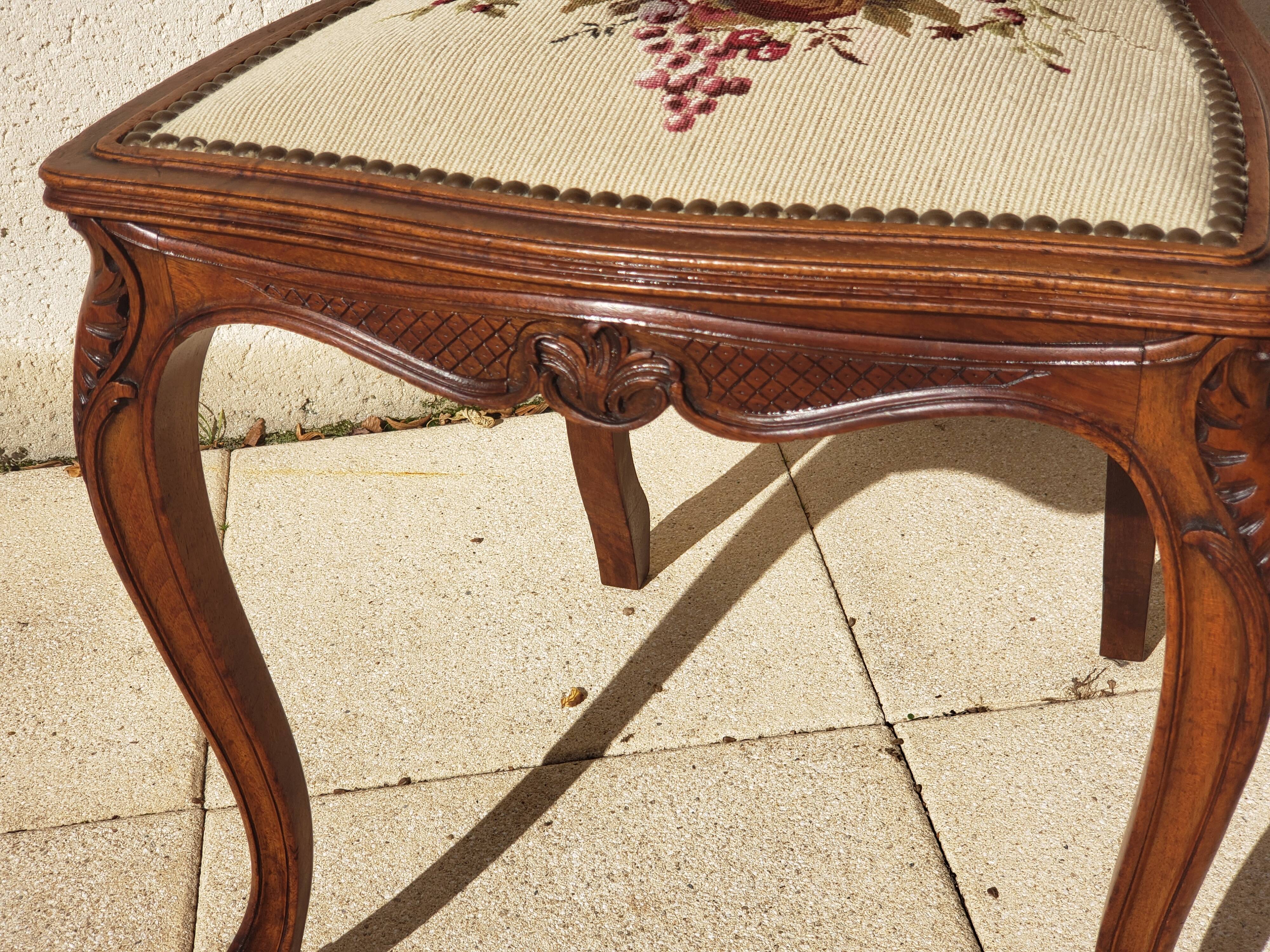 Antique Louis XV style chair in walnut