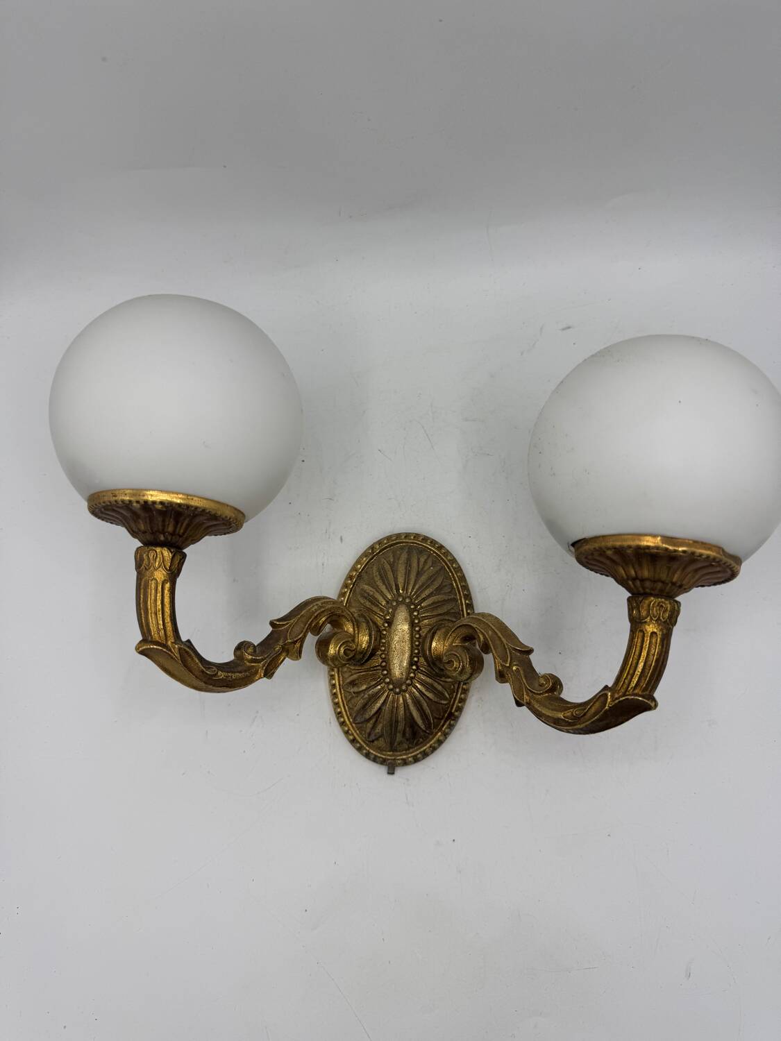 Double gold wall light