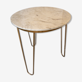 White stone table with golden foot