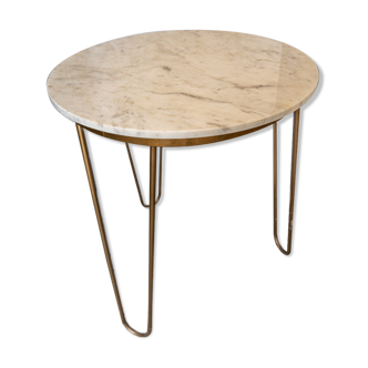 White stone table with golden foot