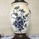 Lampe de table en porcelaine et laiton