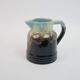 Art Deco pitcher in black, brown and blue glazed ceramic