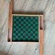 Old game of checkers and small horses