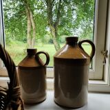 Duo of stoneware decanter bottles