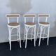 High stools in cane and curved wood 1970-1980