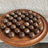 Solitaire game or mineral abacus