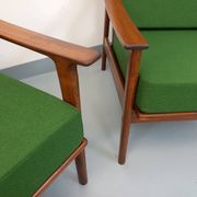 Pair of vintage Scandinavian armchairs in teak and green fabric from the 1960s.