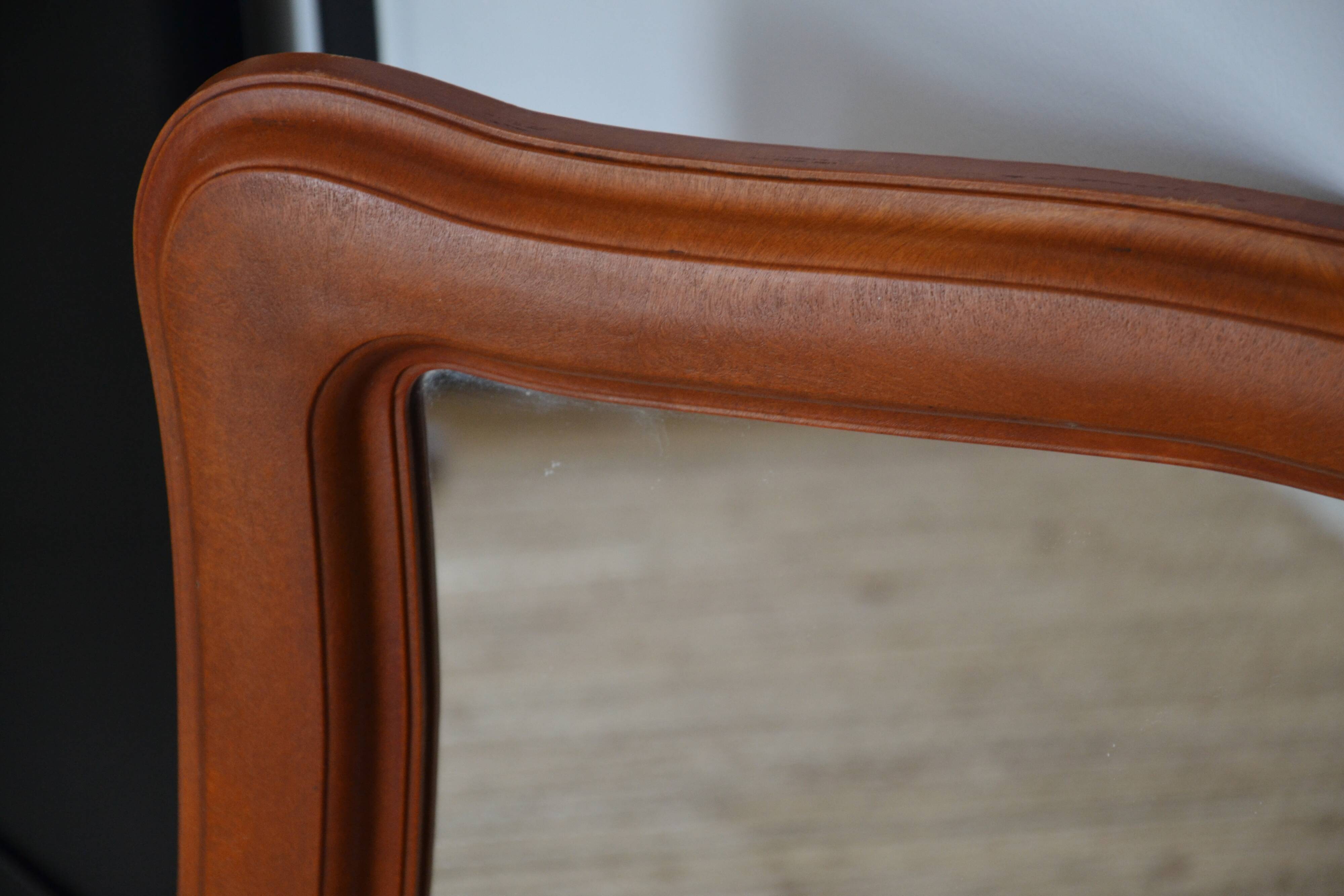 Vintage organic wavy cast resin mirror