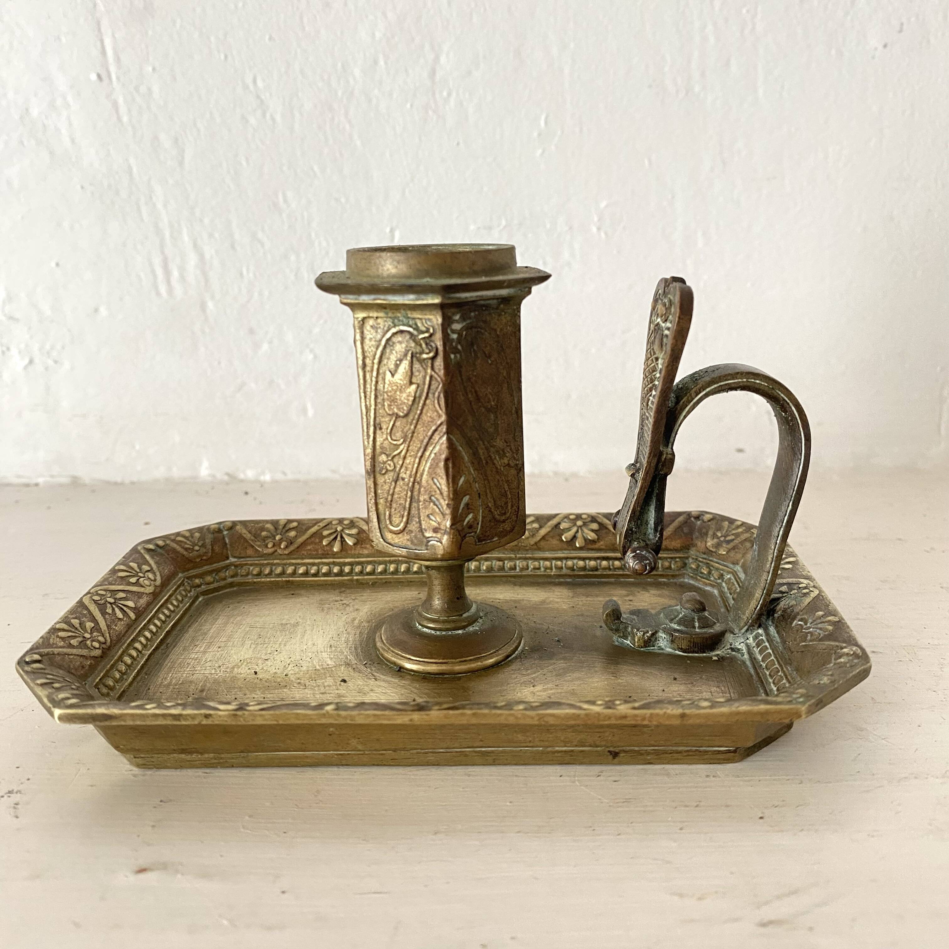 Antique brass thumb candle holder