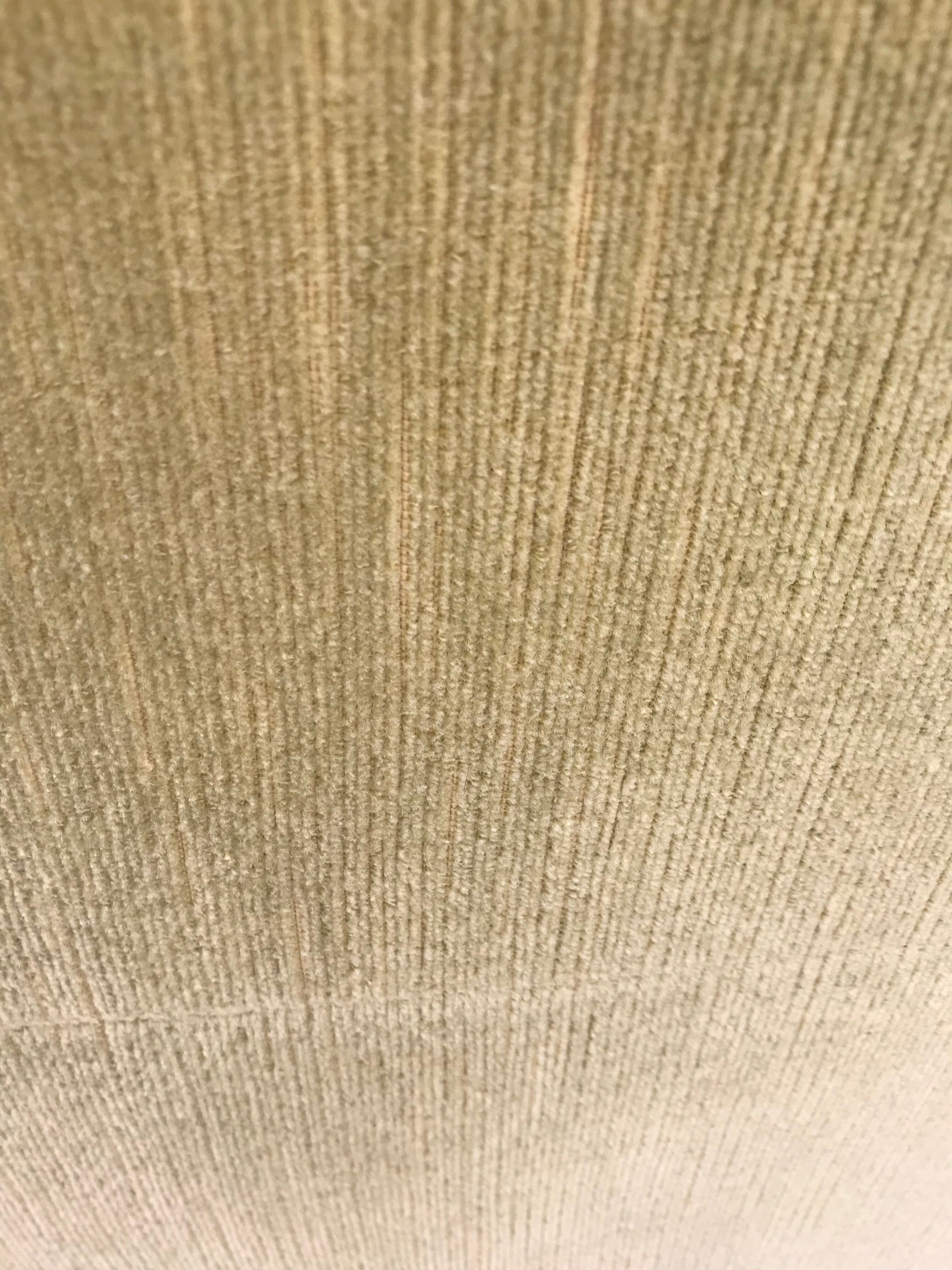 Fauteuil club en velours vert