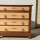 Old chest of drawers with white marble.