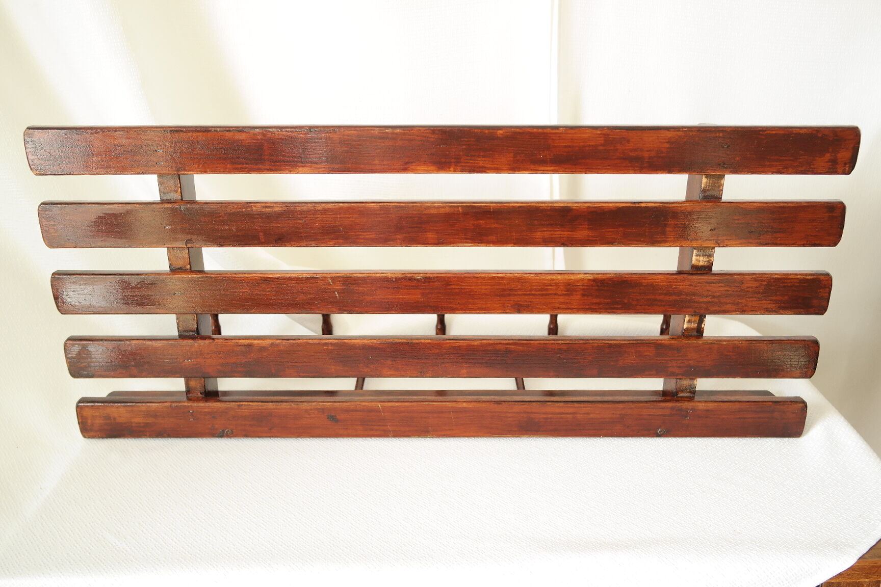 Vintage dark wood wall coat rack