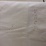 Old sheet with monograms and wide hand made embroider.