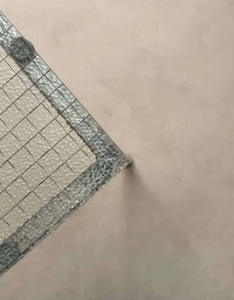 Minimalist 1960s wire glass coffee table in stainless steel.