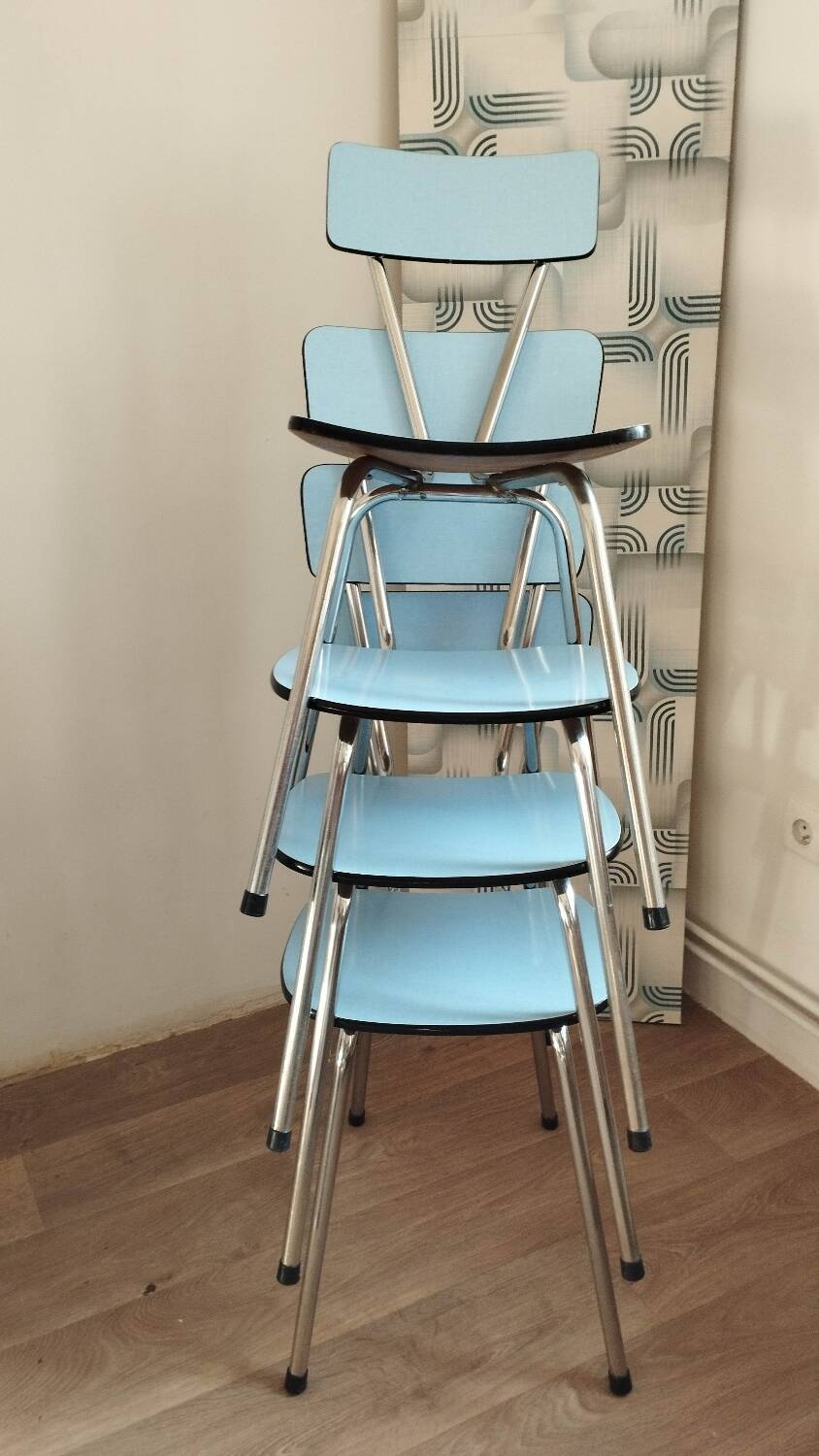 4 blue Formica chairs